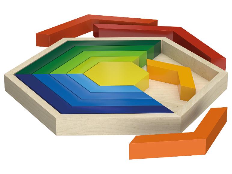 Houten regenboog-legspel met geometrische blokken in de zeshoekige kist