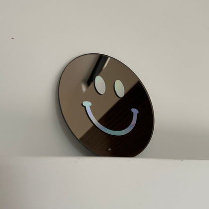 The Small Holographic Smile - wevelnit